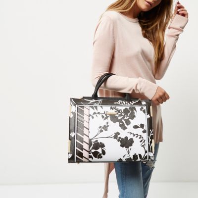 Black and white floral top bar tote bag